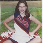 Sarah posing during cheerleading.